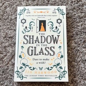 The Shadow in the Glass Book